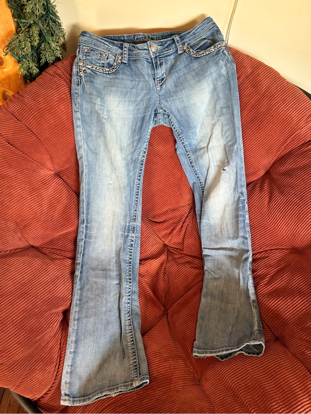 Grace in LA Light Wash Flare Jeans with Subtle Distress
